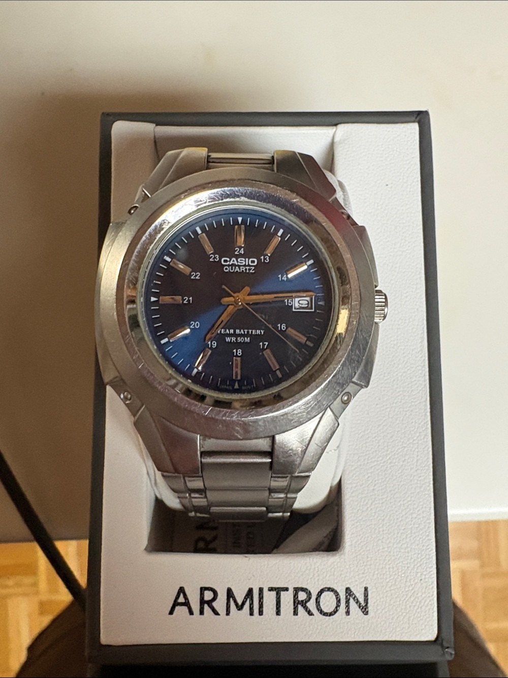 Casio Silver Stainless Steel Watch with Blue Dial